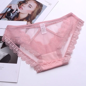 Detailed view of pink floral lace underwear with hollow strap and cotton crotch lining