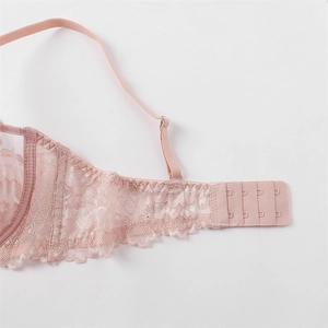 Detail of adjustable straps and four-row back closure on pink floral lace bra
