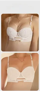Detail of white floral lace bra showing push-up underwire and hollow out design