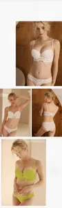 Detailed close-up of lace lingerie set featuring floral patterns and gold metal buckles