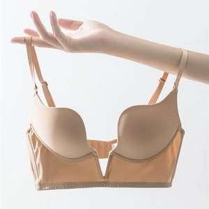 Detail of nude deep V seamless plunge bra with breathable mesh side wings and adjustable straps
