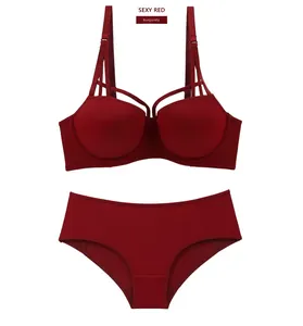 Detailed view of wine red seamless push-up bra set with crisscross straps and smooth cups