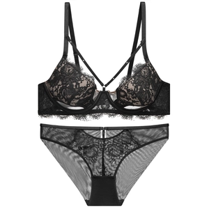 Elegant black lace lingerie set with floral patterns and delicate eyelash lace details