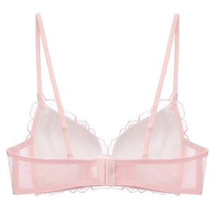 Close-up of pink lace lingerie set with mesh back detail and delicate cross straps