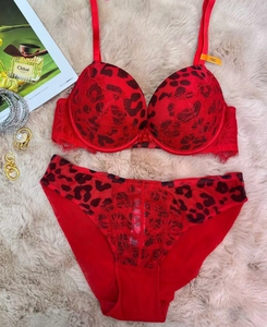 Detail view of red leopard print lace lingerie set with push-up bra and matching panties