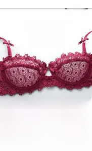 Detail view of burgundy water-soluble floral lace and French style bow design