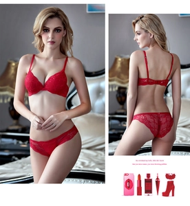 Detail of red lace lingerie set featuring deep V bra and matching hollow panty