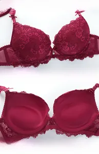 Detailed view of wine red lace bra with 3D molded cups and sparkling crystal pendant