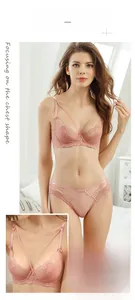 Detail of pink lace lingerie set featuring ultra-thin 3/4 cups and criss-cross straps