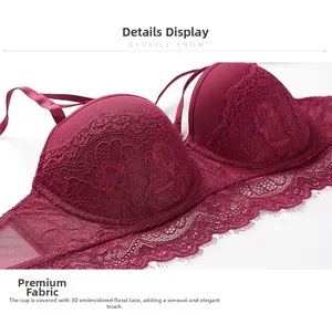 Détail de soutien-gorge dentelle bordeaux avec broderie florale 3D et cils fins