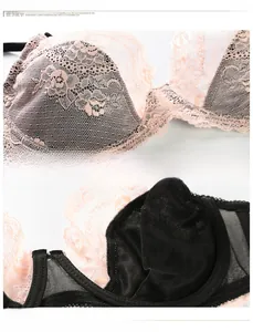 Detailed macro view of pink floral lace embroidery and breathable black mesh lining
