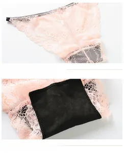 Detail of light pink floral lace panties with breathable black cotton inner crotch lining