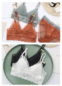 Detail of French lace bralette sets showing floral embroidery and thin shoulder straps