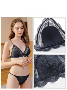 Detail of black lace triangle bra set showing fine floral embroidery and soft cotton lining