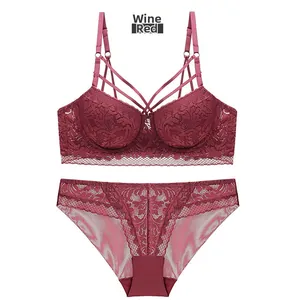 Detailed view of wine red floral lace lingerie set with multi-strap bra and mesh panties