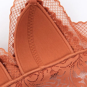 Lace triangle cup bra in brick red featuring delicate hollow mesh and soft padding