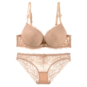 Lace lingerie set featuring deep V push-up bra and matching floral panties in beige