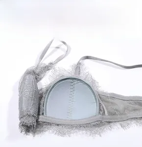 Detailed close-up of grey eyelash lace bralette featuring breathable soft inner pads
