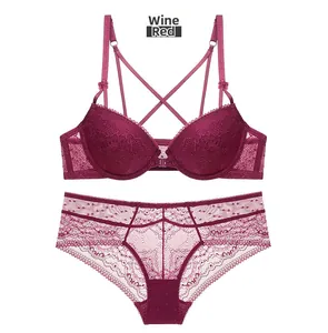 Detail view of burgundy floral lace lingerie set with push-up bra and scalloped panties