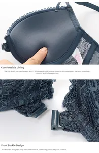 Detail of push-up bra cup softness and front closure mechanism in navy lace