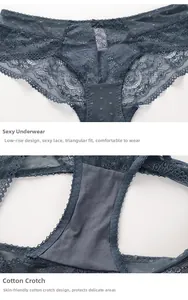 Detail of dark grey lace panties featuring mesh panels and a soft cotton crotch lining