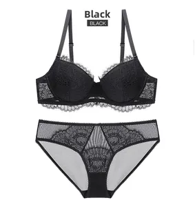 Detail of black eyelash lace lingerie set featuring underwire bra and sheer mesh panties