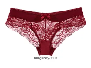 Detail of wine red lace panties featuring floral patterns and a satin bow decoration
