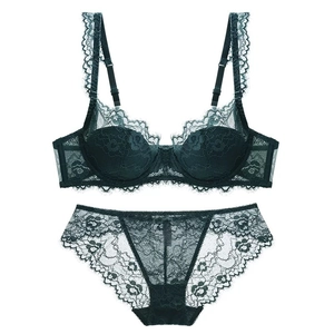 Lace lingerie set with dark green floral mesh bra and matching panty on white background