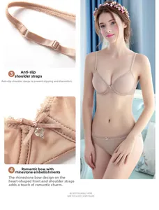 Detail of adjustable non-slip straps and rhinestone heart bow on beige lace lingerie set