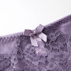 Sexy purple sheer lace women's panties with floral patterns and a satin bow decoration