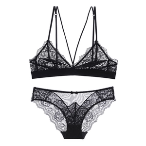 Sexy black lace lingerie set with non-wired triangle cup bra and cross-strap detail