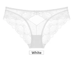 Close-up of white lace panties featuring delicate floral patterns and a central bow detail