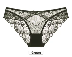 Detailed close-up of dark green floral lace underwear with a delicate bow on the waist