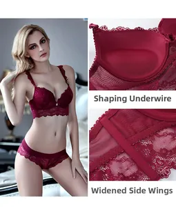 Detailed view of dark red lace bra with shaped underwire and widened side wings support