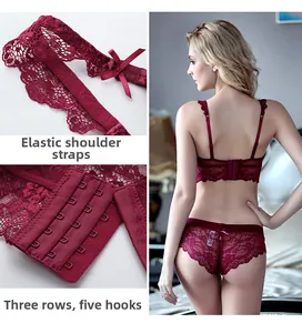 Detail view of deep red lace bra set showing 3 rows 5 hooks closure and elastic straps