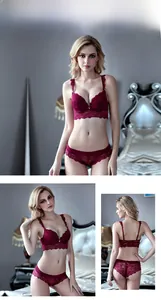 Close-up of lace lingerie set in wine red with floral embroidery and scalloped edges