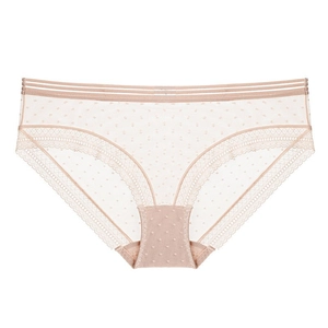 Détail de culotte en mesh transparent à pois, bords dentelle et taille élastique
