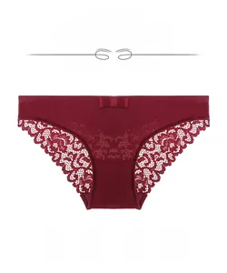 Detail of red lace panties with silk-satin fabric, featuring a soft bow and breathable mesh