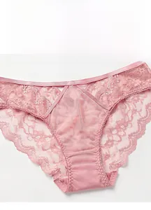 Close-up of pink lace panties featuring floral hollow-out design and breathable cotton crotch