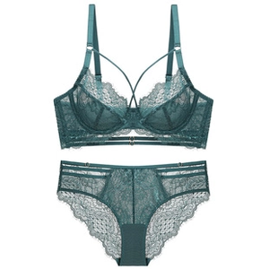 Detailed view of elegant dark green lace lingerie set with intricate strap detailing