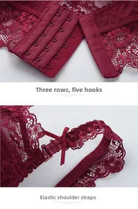 Detailed view of dark red lace bra featuring a 3-row hook closure and elastic straps