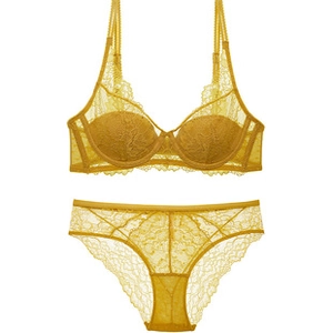Detailed view of yellow lace lingerie set featuring a wired bra and matching briefs
