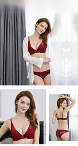 Detailed view of burgundy lace lingerie set with elegant bow and floral patterns