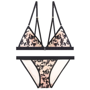 Nude lace lingerie set with black floral embroidery and wire-free triangle bra