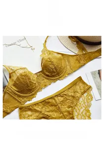 Detailed flat lay of vibrant yellow eyelash lace bra and matching panty set