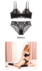 Dettaglio del set lingerie in pizzo floreale nero con ricamo e bordi smerlati