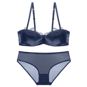 Navy blue lace satin lingerie set with push up bra and matching mesh panties on white base