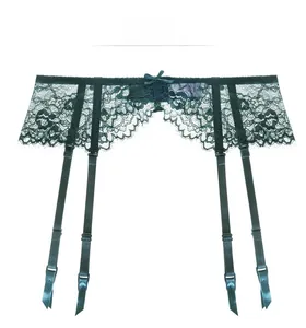 Detail of dark green eyelash lace garter belt with adjustable straps and bow