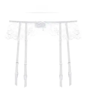 Close-up detail of white floral lace garter belt with four adjustable straps and bow