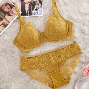 Elegant mustard yellow floral lace lingerie set with underwire bra and matching panties
